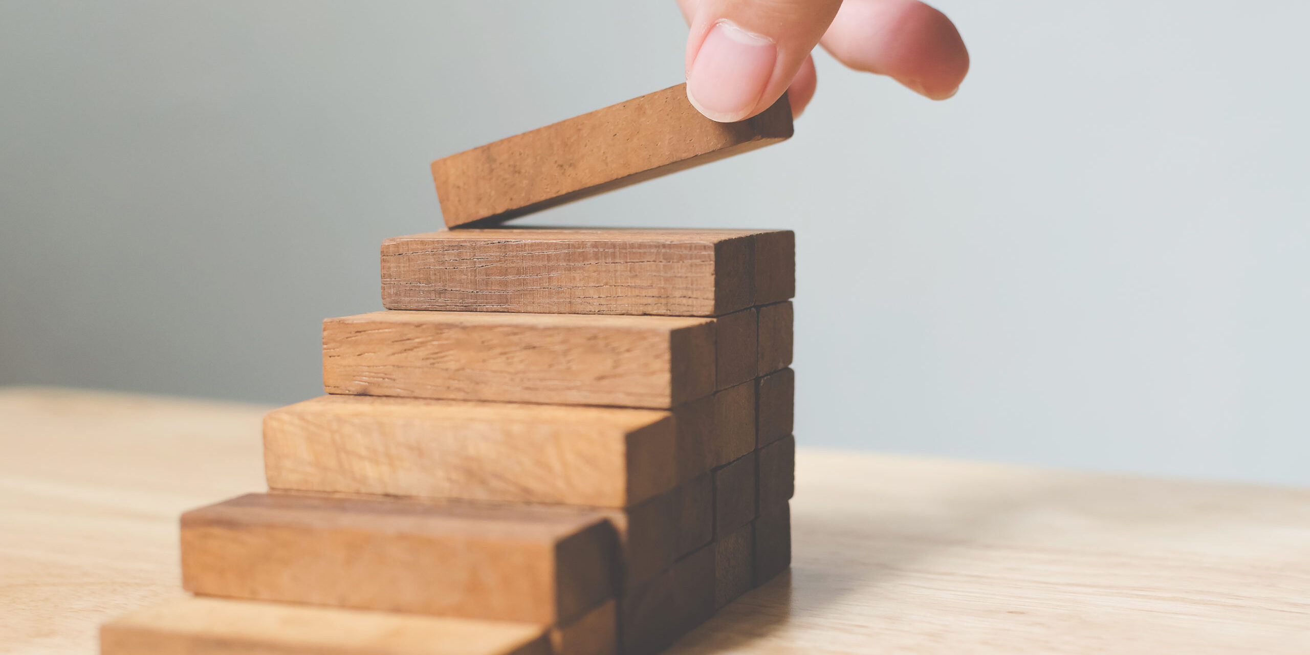 Hand,Arranging,Wood,Block,Stacking,As,Step,Stair.,Ladder,Career